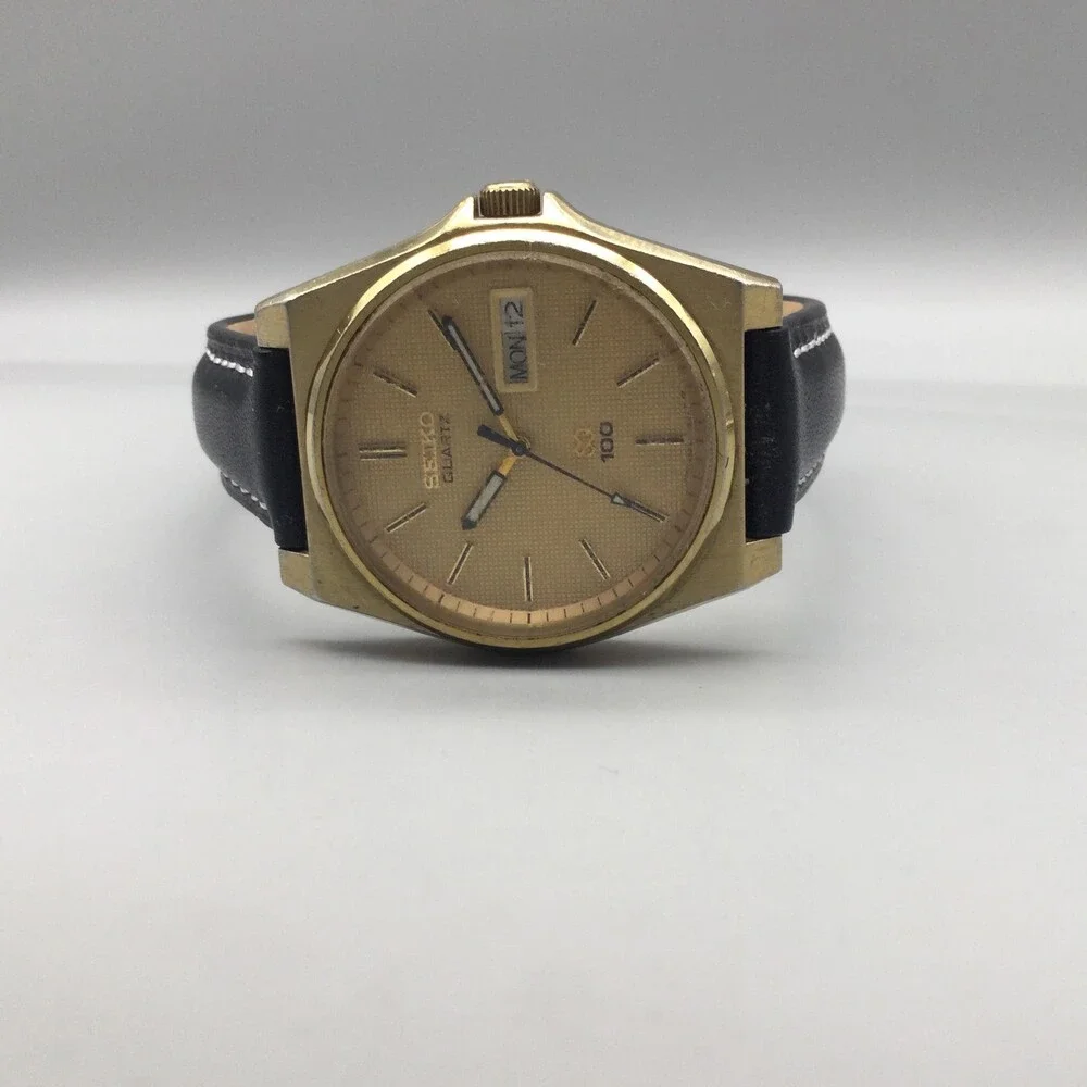 Vintage Seiko SQ 100 Mens Watch 33mm Gold Tone Day Date 6923-8010 New Battery